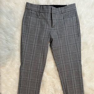 Zip fly with hook-and-bar closure. Belt loops. Front and rear welt pockets.